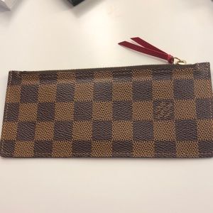 LV Pouch good for debit/credit Cards.